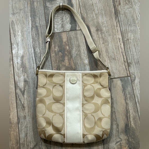 Coach Handbags - Coach Beige Signature Shoulder Bag Adjustable Strap. Will need some cleaning